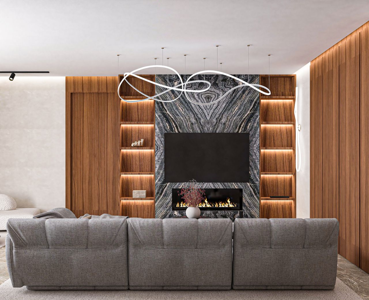 services-04 Elegant living room with modern fireplace, grey sofa, and wooden design elements.